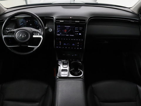 Hyundai Tucson 1.6 T-GDI HEV Premium | Leder | Stoelventilatie | Adaptive cruise | 360 camera | Carplay | Stuurverwarming | Memory | Navigatie | Full LED
