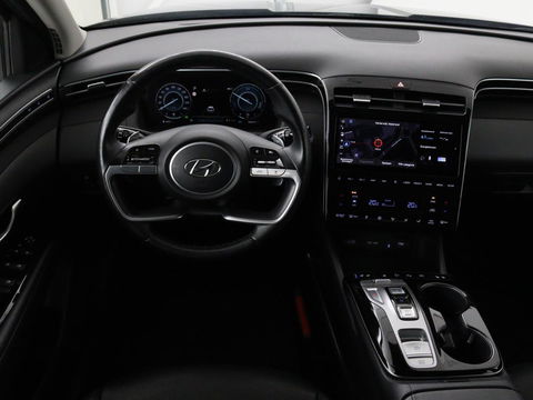 Hyundai Tucson 1.6 T-GDI HEV Premium | Leder | Stoelventilatie | Adaptive cruise | 360 camera | Carplay | Stuurverwarming | Memory | Navigatie | Full LED
