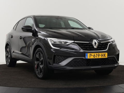 Renault Arkana 1.6 E-Tech Hybrid 145 R.S. Line | Leder/Alcantara | Stoel & stuurverwarming | Adaptive cruise | Camera | BOSE Sound | Carplay | Sfeerverlichting | Full LED | Keyless | Navigatie | Climate control