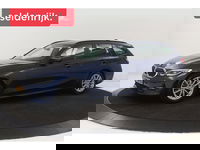 BMW 3 Serie - 318i Business Edition | Stoelverwarming | Camera | Carplay | Live Cockpit | Full LED | Navigatie | Dodehoek detectie | Climate control