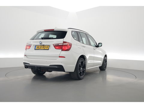 BMW X3 xDrive20d | HUD | Schuif-/kanteldak | Afn. Trekhaak | Camera | Navi | Stoelverw. | LED