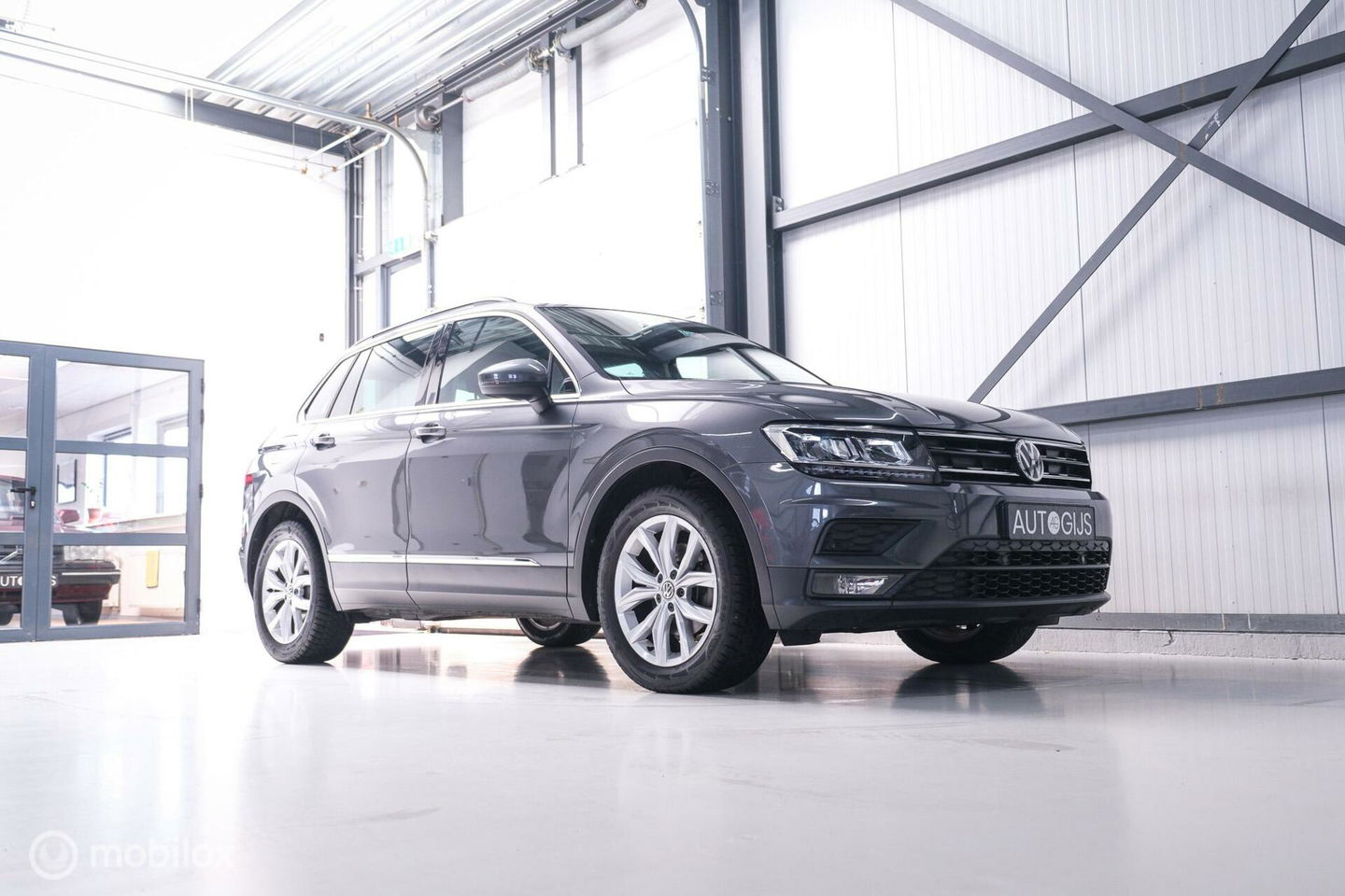 Volkswagen Tiguan 1.4 TSI ACT Comfortline | Trekhaak | Adaptive | 1e eigenaar | Clima | Stoelverwarming | rijklaarprijs |