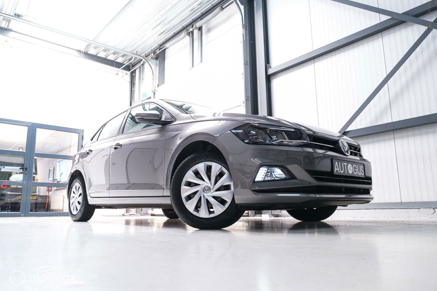 Volkswagen Polo 1.0 TSI Comfortline | Adaptive | NAP NL auto | DAB | All season | Limestone | LED | Navigatie |