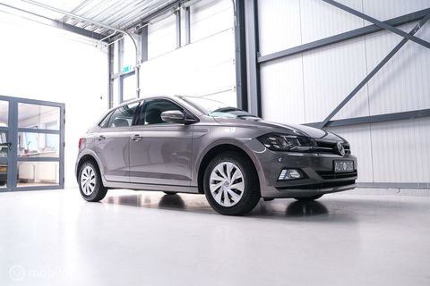 Volkswagen Polo 1.0 TSI Comfortline | Adaptive | NAP NL auto | DAB | All season | Limestone | LED | Navigatie |