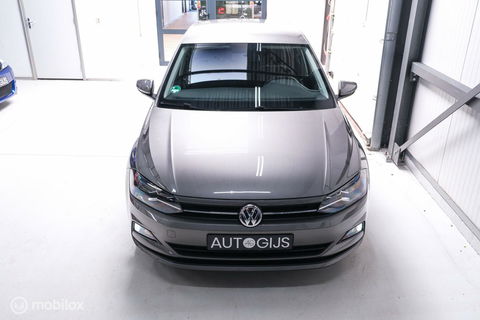 Volkswagen Polo 1.0 TSI Comfortline | Adaptive | NAP NL auto | DAB | All season | Limestone | LED | Navigatie |