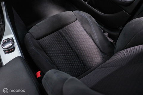 BMW 1-serie 116i M Sport | Estoril blue | Alcantara | LED | M performance | unieke auto | NAP orig NL | Trekhaak | 19 inch |