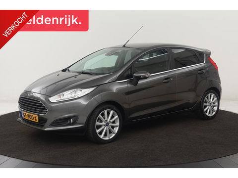 Ford Fiesta 1.0 EcoBoost Titanium | Camera | Trekhaak | Climate control | Navigatie | Cruise control | Verwarmde voorruit | PDC | Regensensor