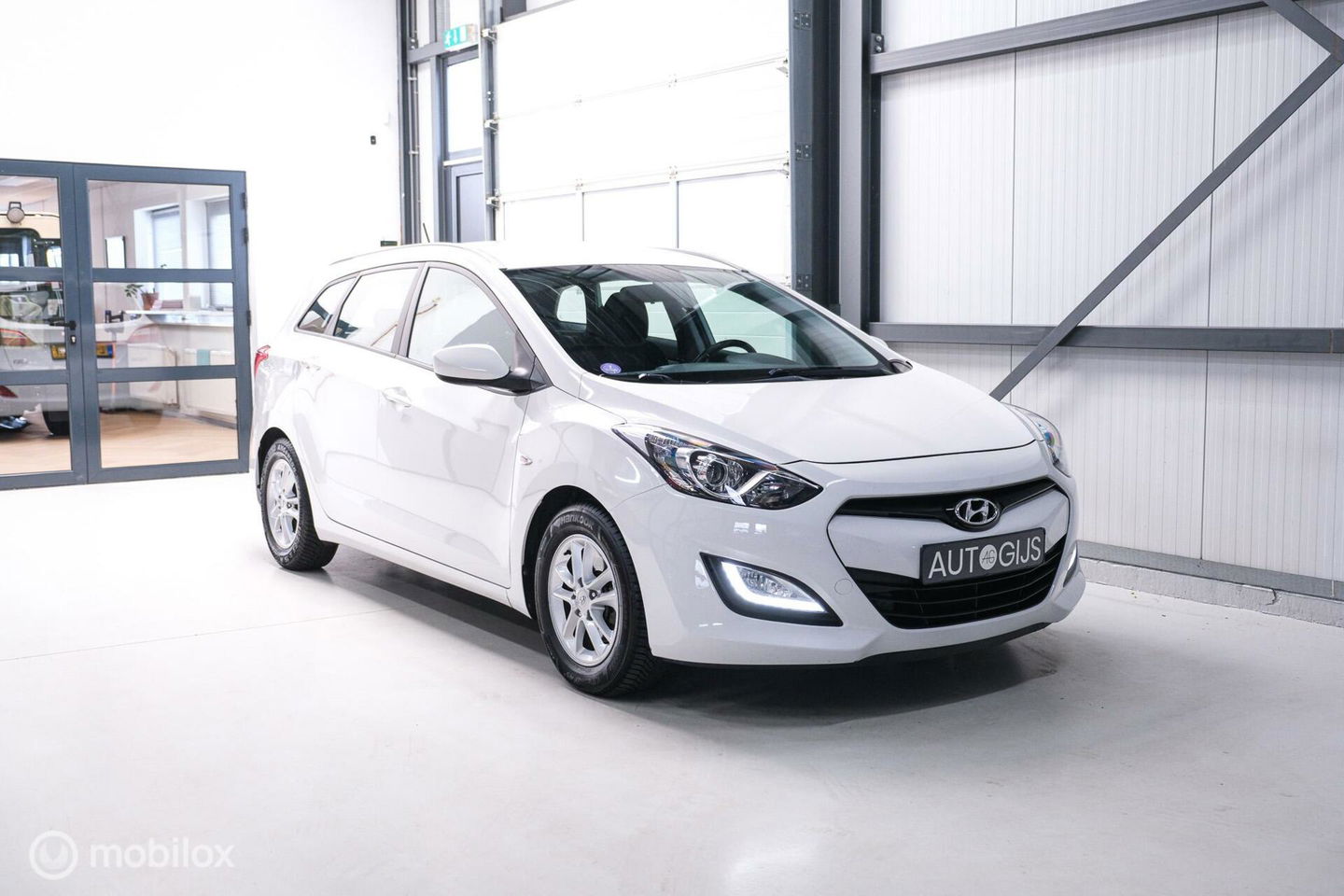 Hyundai i30 Wagon 1.6 GDI 120 pk | Trekhaak | Clima | Cruise | Stuurwielverwarming | All seasons | Nieuwe APK |