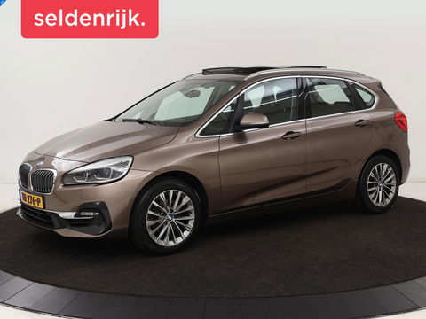 BMW 2 Serie Active Tourer 218i High Executive | Panoramadak | Head-up | Leder | Stoelverwarming | Cruise control | Camera | Climate control | LMV 17 inch