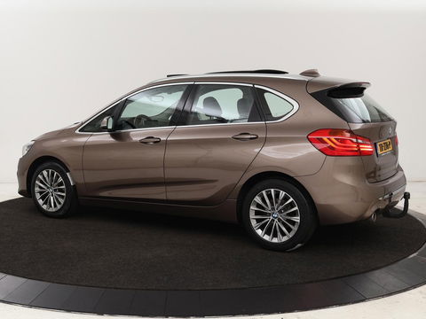 BMW 2 Serie Active Tourer 218i High Executive | Panoramadak | Head-up | Leder | Stoelverwarming | Cruise control | Camera | Climate control | LMV 17 inch