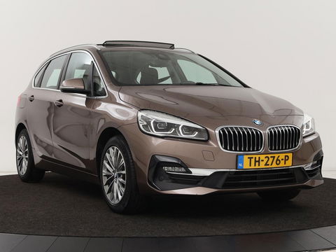 BMW 2 Serie Active Tourer 218i High Executive | Panoramadak | Head-up | Leder | Stoelverwarming | Cruise control | Camera | Climate control | LMV 17 inch