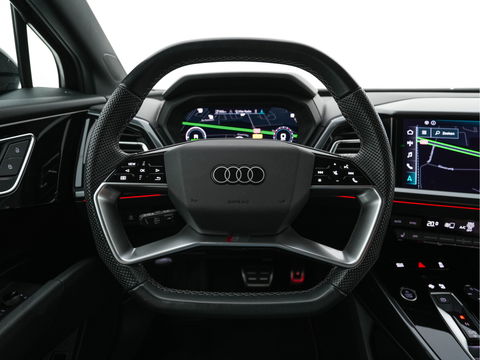 Audi Q4 e-tron 40 S edition 77 kWh S-Line-Sportpack [ 3-Fase ] (INCL-BTW) *HEAT-PUMP | LEATHER-FABRIC | MATRIX-LED | ADAPTIVE-CRUISE | AMBIENT-LIGHT | DIGI-COCKPIT | AUDI-SOUND | DAB+ | KEYLESS | SHIFT-PADDLES | CAMERA | HEATED-SPORTSEATS | 20''ALU*