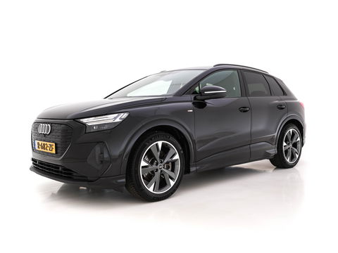 Audi Q4 e-tron 40 S edition 77 kWh S-Line-Sportpack [ 3-Fase ] (INCL-BTW) *HEAT-PUMP | LEATHER-FABRIC | MATRIX-LED | ADAPTIVE-CRUISE | AMBIENT-LIGHT | DIGI-COCKPIT | AUDI-SOUND | DAB+ | KEYLESS | SHIFT-PADDLES | CAMERA | HEATED-SPORTSEATS | 20''ALU*