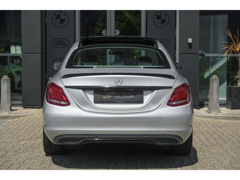 Mercedes-Benz C-Klasse C180 156pk Ambition Panoramadak 1/2 Leder Navigatie Stoelverwarming Led intelligent NLauto NAP 17" LMV