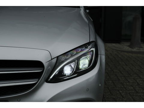 Mercedes-Benz C-Klasse C180 156pk Ambition Panoramadak 1/2 Leder Navigatie Stoelverwarming Led intelligent NLauto NAP 17" LMV