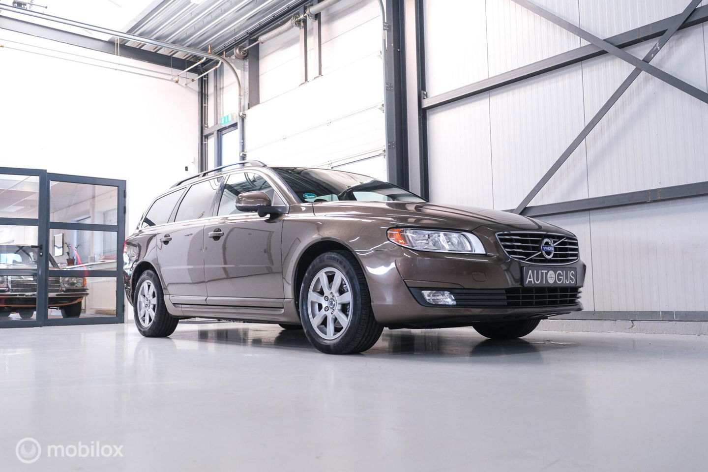 Volvo V70 1.6 T4 Momentum | Schuifdak | trekhaak | nieuwe D-riem | rijklaar | stoelverwarming | navigatie | cruise |