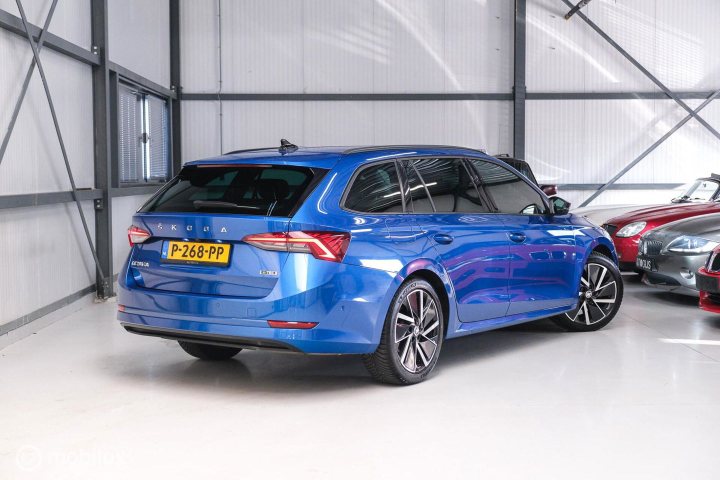 Škoda Octavia Combi 1.5 e-TSI Business Edition Plus | Racing Blue | Trekhaak | Virtual cockpit | LED | rijklaarprijs |