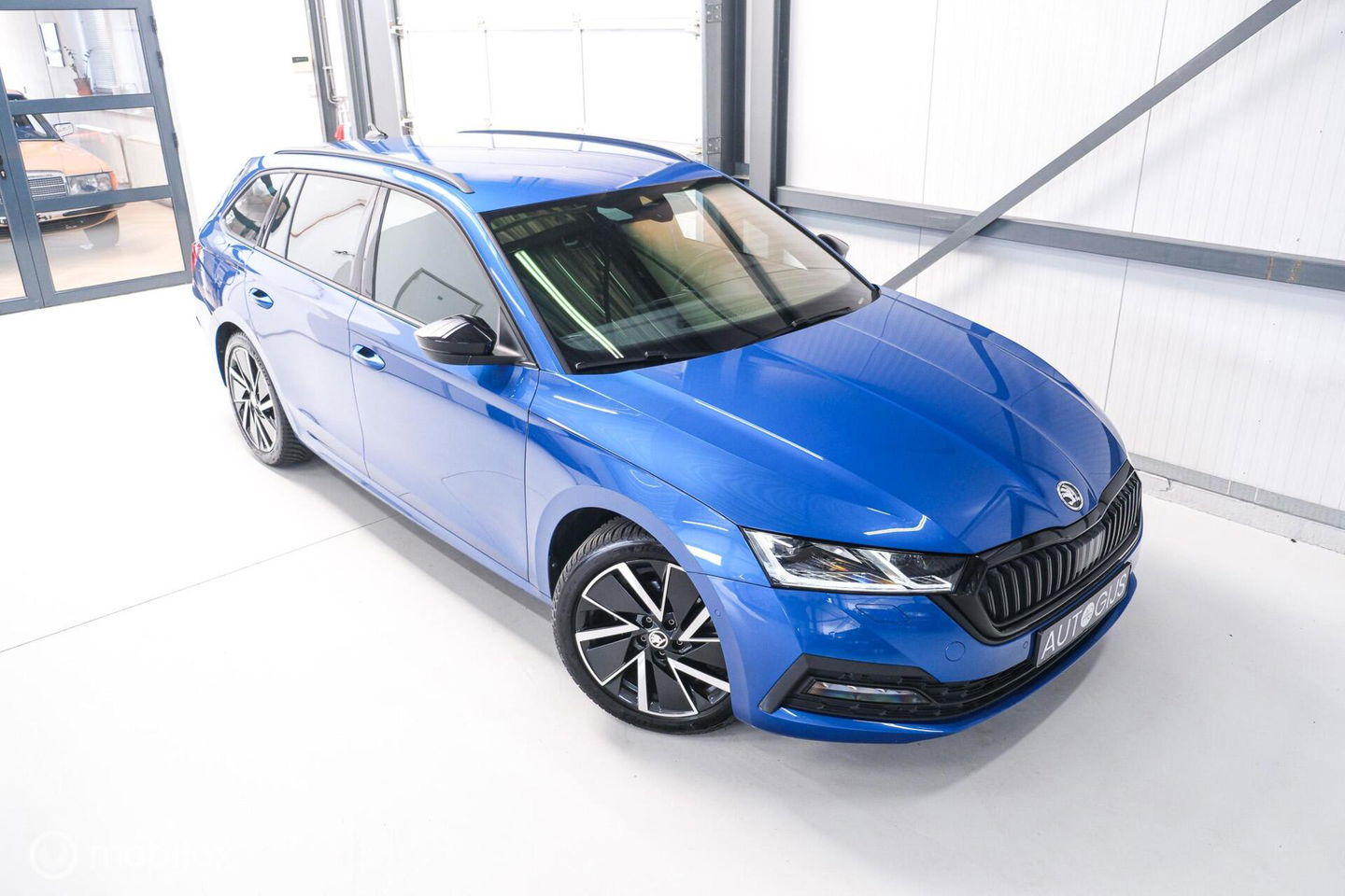 Škoda Octavia Combi 1.5 e-TSI Business Edition Plus | Racing Blue | Trekhaak | Virtual cockpit | LED | rijklaarprijs |