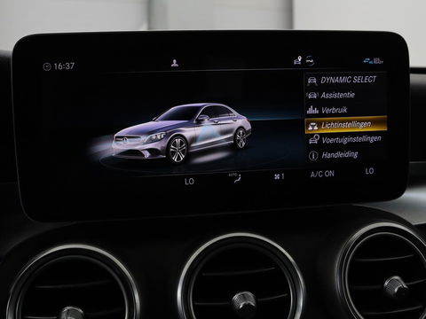 Mercedes-Benz C-Klasse 180 Business Solution AMG | Panoramadak | Leder | Stoelverwarming | Cruise control | 360 Camera | Elektrische achterklep | Carplay | Burmester