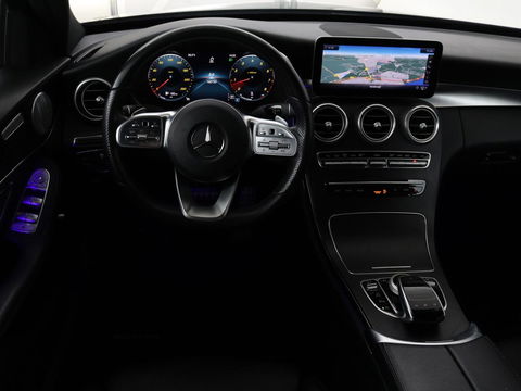 Mercedes-Benz C-Klasse 180 Business Solution AMG | Panoramadak | Leder | Stoelverwarming | Cruise control | 360 Camera | Elektrische achterklep | Carplay | Burmester