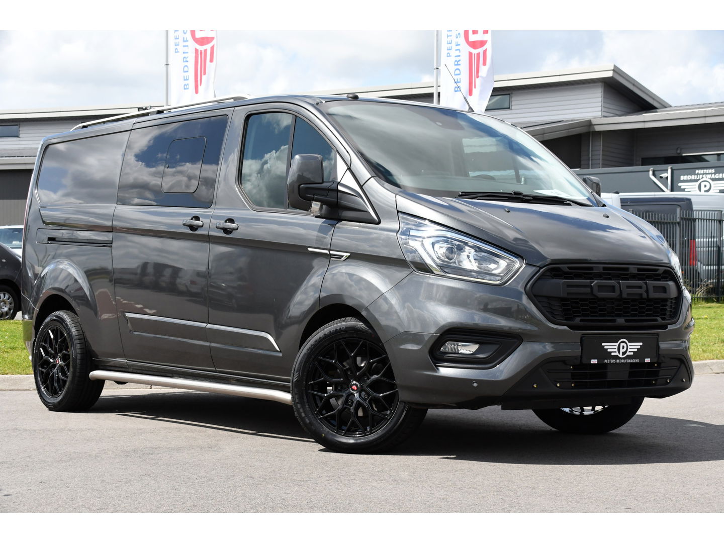 Ford Transit Custom 320 2.0 TDCI L2H1 Raptor Edition DC Limited Camera, Cruise, Sensoren, 130PK, Automaat, Multimedia, Stoelverwarming, 2 x Schuifdeur, Uniek!