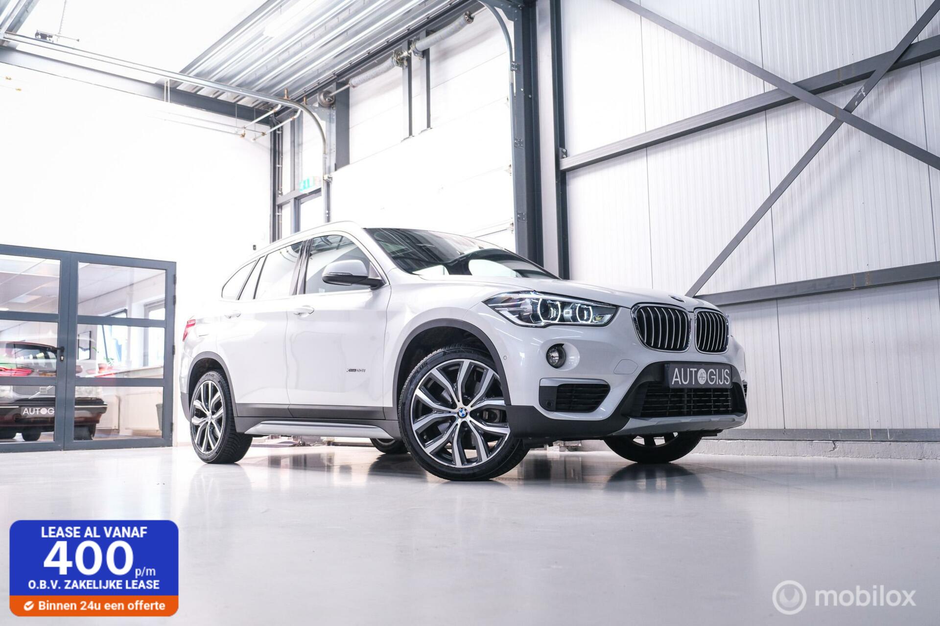 BMW X1 xDrive20i High Executive | 4x4 | HUD | Trekhaak | Leder | Orig NL auto | Dealer onderhouden | Camera | rijklaarprijs |