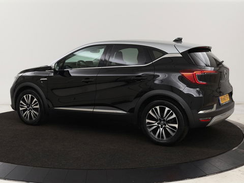 Renault Captur 1.6 E-Tech Hybrid 145 Initiale Paris | Leder | Stoel & stuurverwarming | Camera | Full LED | Park Assist | Carplay | BOSE Sound