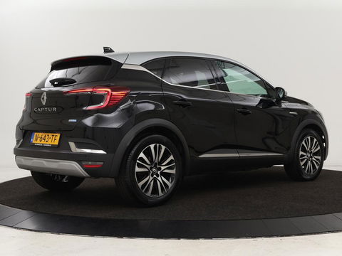 Renault Captur 1.6 E-Tech Hybrid 145 Initiale Paris | Leder | Stoel & stuurverwarming | Camera | Full LED | Park Assist | Carplay | BOSE Sound