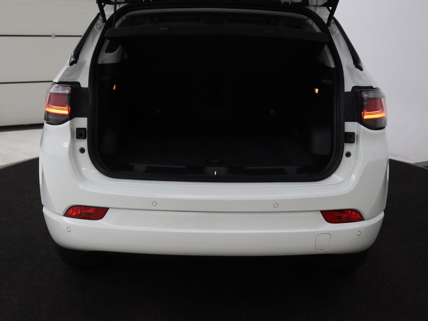 Jeep Compass 4xe 240 Plug-in Hybride Electric S | Leder | Stoel & stuurverwarming | Camera | Adaptive cruise | Carplay | Navigatie