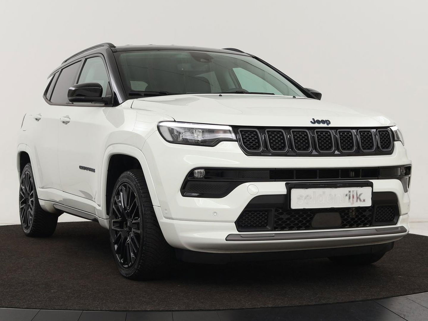 Jeep Compass 4xe 240 Plug-in Hybride Electric S | Leder | Stoel & stuurverwarming | Camera | Adaptive cruise | Carplay | Navigatie
