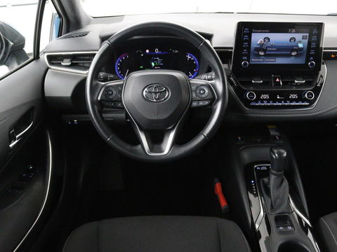Toyota Corolla 1.8 Hybrid Business Plus | Trekhaak | Stoelverwarming | Adaptive cruise | Carplay | Full LED | Keyless | Camera | DAB | Climate control