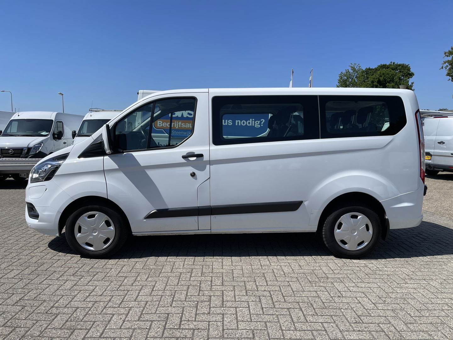 Ford Transit Custom 320 1.0 EcoBoost hybride / L1H1 PHEV Trend 9 persoons / € 38.950 incl btw bpm / lease vanaf € / airco / cruise / automaat / stoelverwarming / isofix !