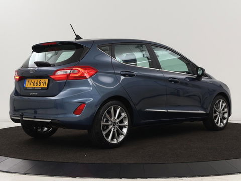 Ford Fiesta 1.0 EcoBoost Vignale | 125pk | Stoel & stuurverwarming | Half leder | B&O Sound | Trekhaak | Carplay | Keyless | Camera | Climate control | Park Assist | Cruise control | Navigatie