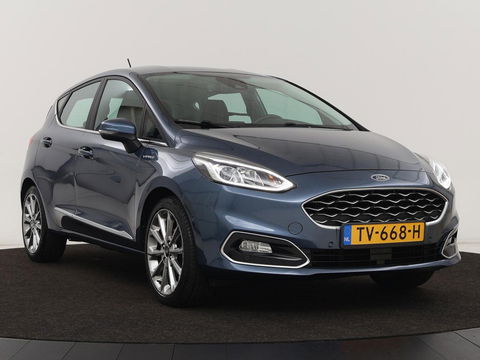 Ford Fiesta 1.0 EcoBoost Vignale | 125pk | Stoel & stuurverwarming | Half leder | B&O Sound | Trekhaak | Carplay | Keyless | Camera | Climate control | Park Assist | Cruise control | Navigatie