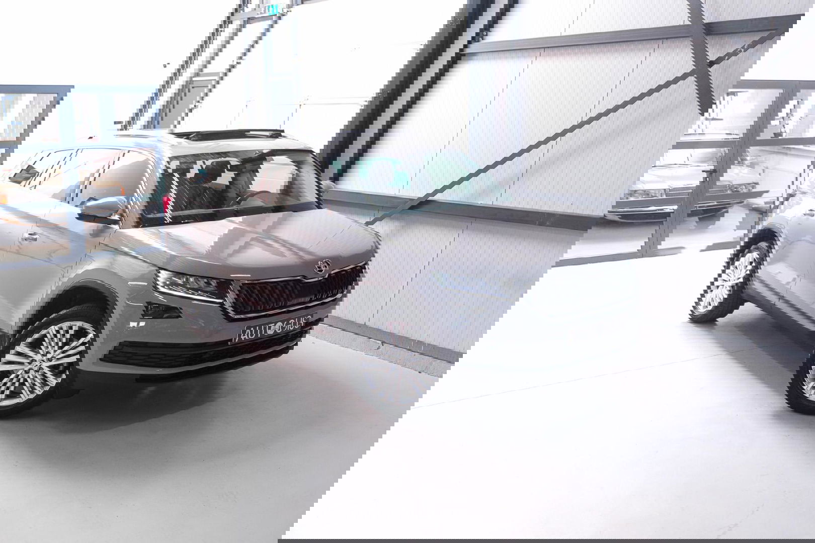 Škoda Kodiaq 1.5 TSI Business ed. DSG | 7 pers | Panorama | Trekhaak | LED | Steel Grey | Camera | Apple CarPlay | Adaptive |