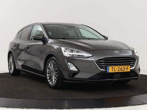 Ford Focus 1.0 EcoBoost Titanium | Stoel & stuurverwarming | Camera | Adaptive cruise | Carplay | B&O Sound | Navigatie | Full LED | Climate control