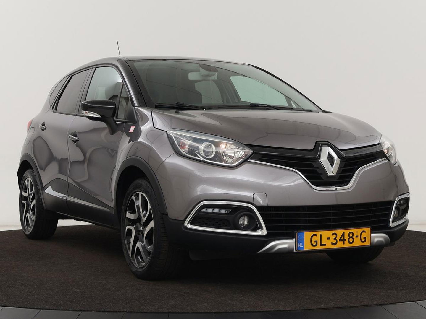 Renault Captur 0.9 TCe Helly Hansen | 1e eigenaar | Stoelverwarming | Trekhaak | Camera | Navigatie | Keyless | Climate control | Cruise control | LED