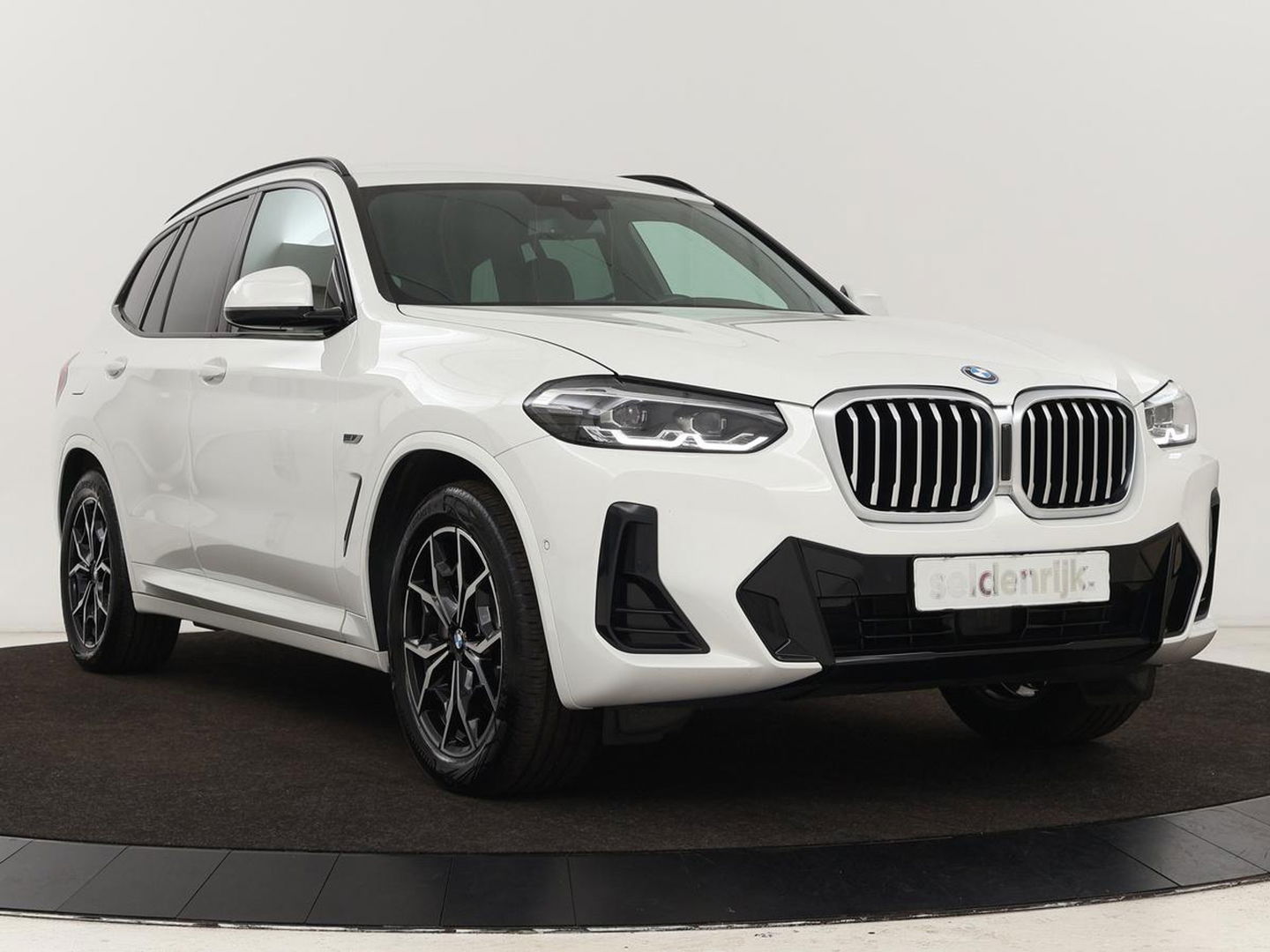 BMW X3 xDrive30e M-Sport | Leder | Adaptive cruise | Stoel & stuurverwarming | Carplay | Camera | Sportstoelen | Live Cockpit | Full LED | Navigatie