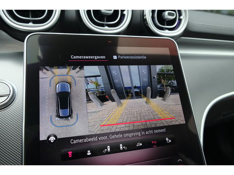 Mercedes-Benz C-Klasse Estate C300e AMG 313pk Hybrid Panoramadak Massage Digital light Trekhaak elektrisch MBUX