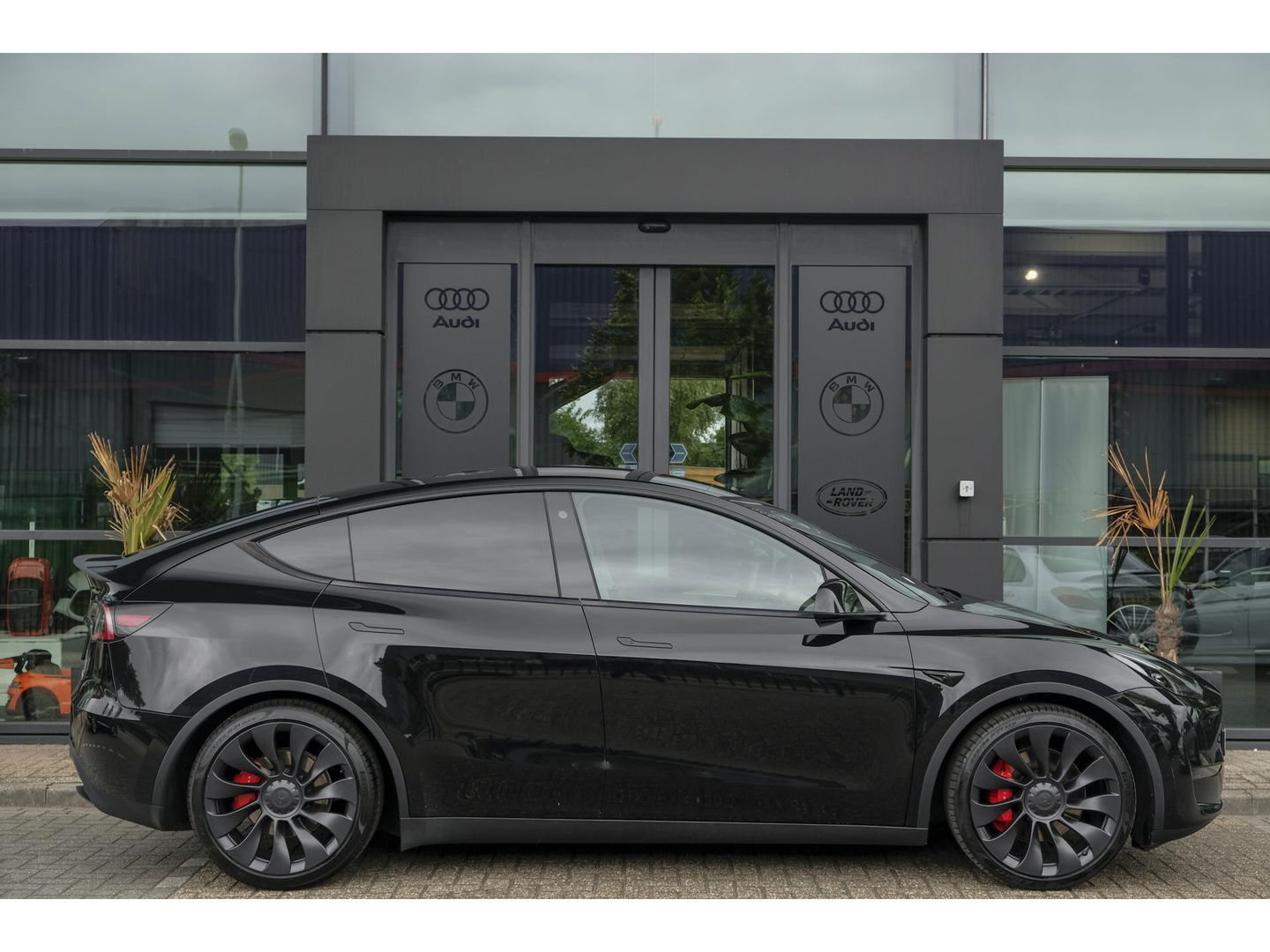 Tesla Model Y Performance 462pk AWD 75 kWh Black edition Panoramadak *BTW* NLauto 1e eigenaar