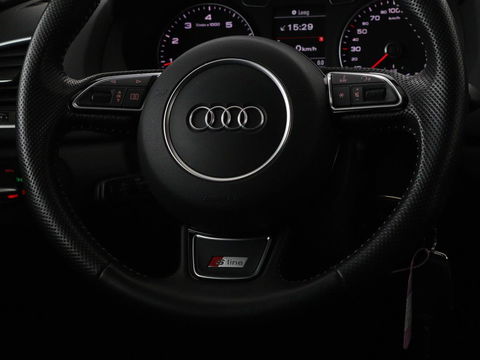 Audi Q3 1.4 TFSI Sport S Line Edition | Origineel NL | Half leder | Trekhaak | Full LED | Sportstoelen | Navigatie | Climate control | Parkeerhulp | Cruise control | Bluetooth | Getint glas