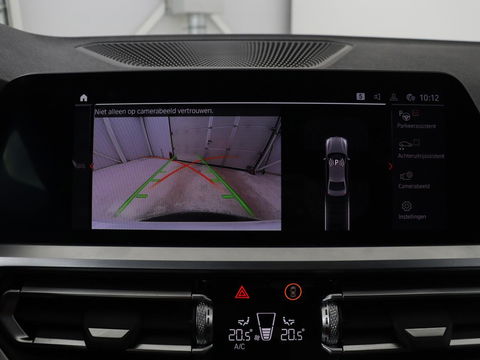 BMW 3 Serie 318i Executive Edition | Sport Line | Stoelverwarming | Camera | Trekhaak | Half leder | Full LED | Carplay | Live Cockpit
