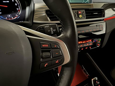BMW X1 sDrive20i Sport Pano H/K HUD Leer Camera ACC NAP