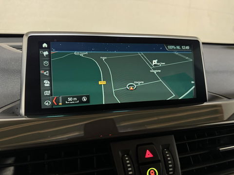 BMW X1 sDrive20i Sport Pano H/K HUD Leer Camera ACC NAP