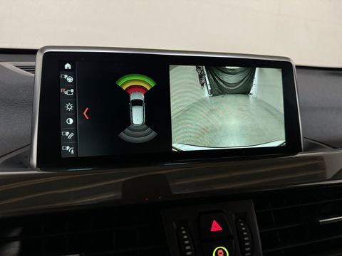 BMW X1 sDrive20i Sport Pano H/K HUD Leer Camera ACC NAP