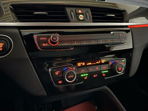 BMW X1 sDrive20i Sport Pano H/K HUD Leer Camera ACC NAP