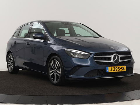 Mercedes-Benz B-Klasse 180 Business Solution Luxury | Leder | Stoelverwarming | Carplay | Sfeerverlichting | Camera | Widescreen | Full LED | Navigatie