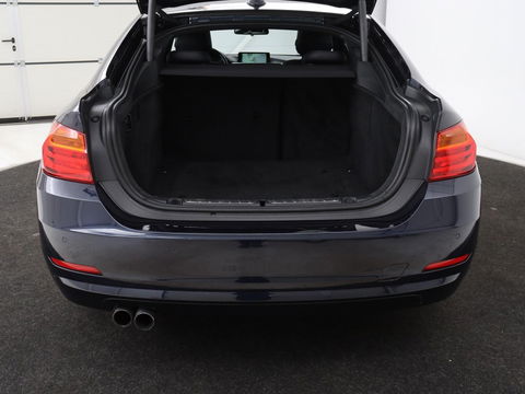 BMW 4 Serie Gran Coupé 420i High Executive | Schuifdak | Harman/Kardon | Stoelverwarming | Leder | Camera | DAB | Xenon | Sportstoelen