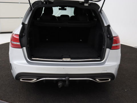 Mercedes-Benz C-Klasse 180 Business Solution AMG | Stoelverwarming | 360 Camera | Trekhaak | Digital Cockpit | Leder/Alcantara | Full LED | Navigatie | Park Assist