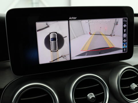 Mercedes-Benz C-Klasse 180 Business Solution AMG | Stoelverwarming | 360 Camera | Trekhaak | Digital Cockpit | Leder/Alcantara | Full LED | Navigatie | Park Assist
